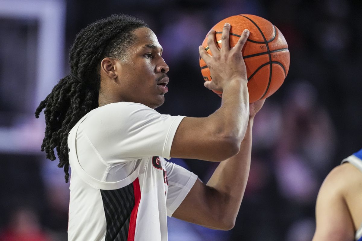 Dec 19, 2024; Athens, Georgia, USA; Georgia Bulldogs guard Silas Demary Jr. (5) looks to pass against the Buffalo Bulls at Stegeman Coliseum. Mandatory Credit: Dale Zanine-Imagn Images