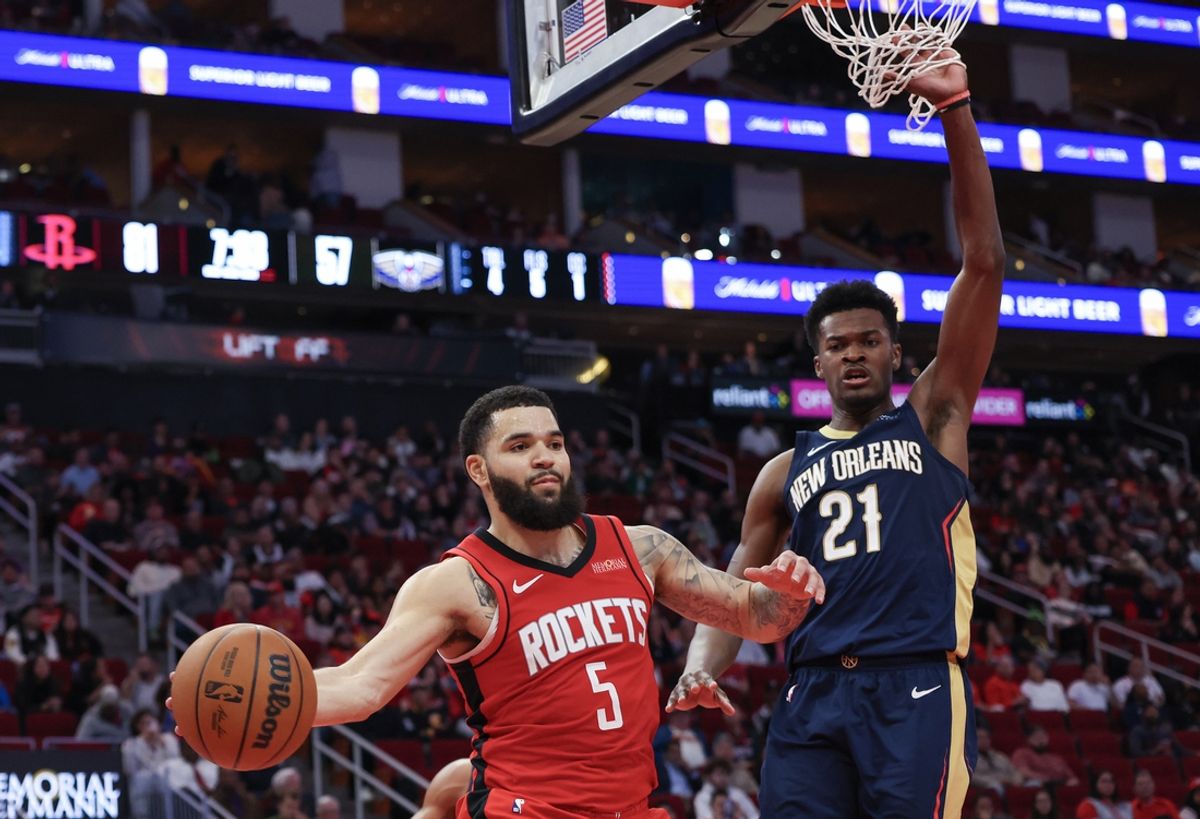 Dec 19, 2024; Houston, Texas, USA; Houston Rockets guard Fred VanVleet (5) passes against New Orleans Pelicans center Yves Missi (21) in the second half at Toyota Center. Mandatory Credit: Thomas Shea-Imagn Images