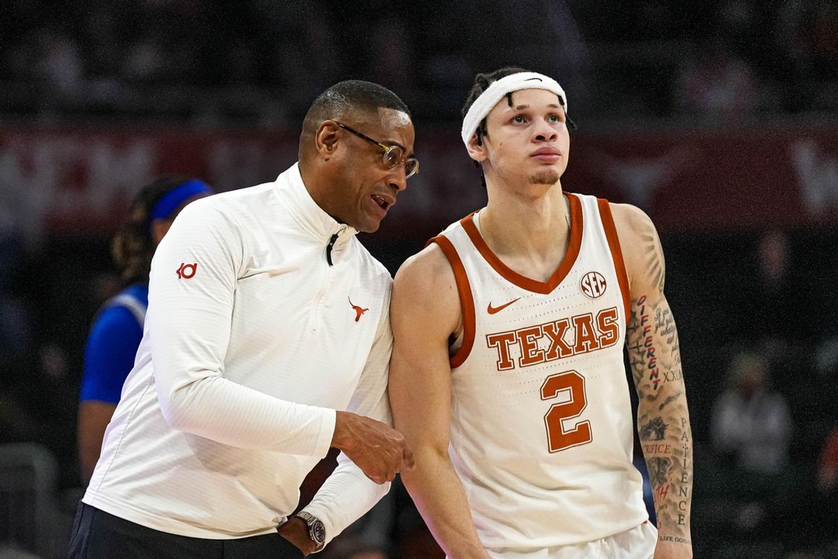 Texas Longhorns head coach Rodney Terry talks to guard Chendall Weaver (2) during the game against New Orleans at the Moody Center on Thursday, Dec. 19, 2024.