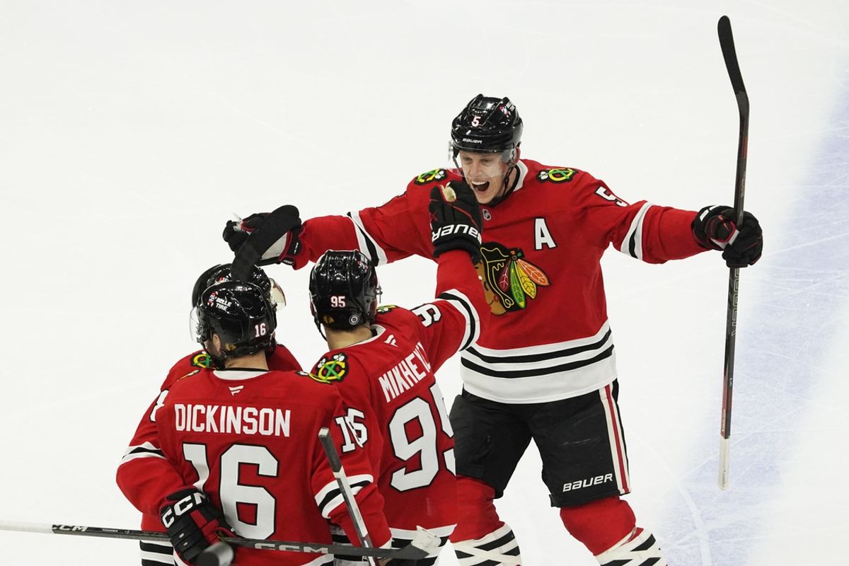 Dec 19, 2024; Chicago, Illinois, USA; Chicago Blackhawks right wing Ilya Mikheyev (95) celebrates a goal against the Seattle Kraken during the third period at United Center. Mandatory Credit: David Banks-Imagn Images