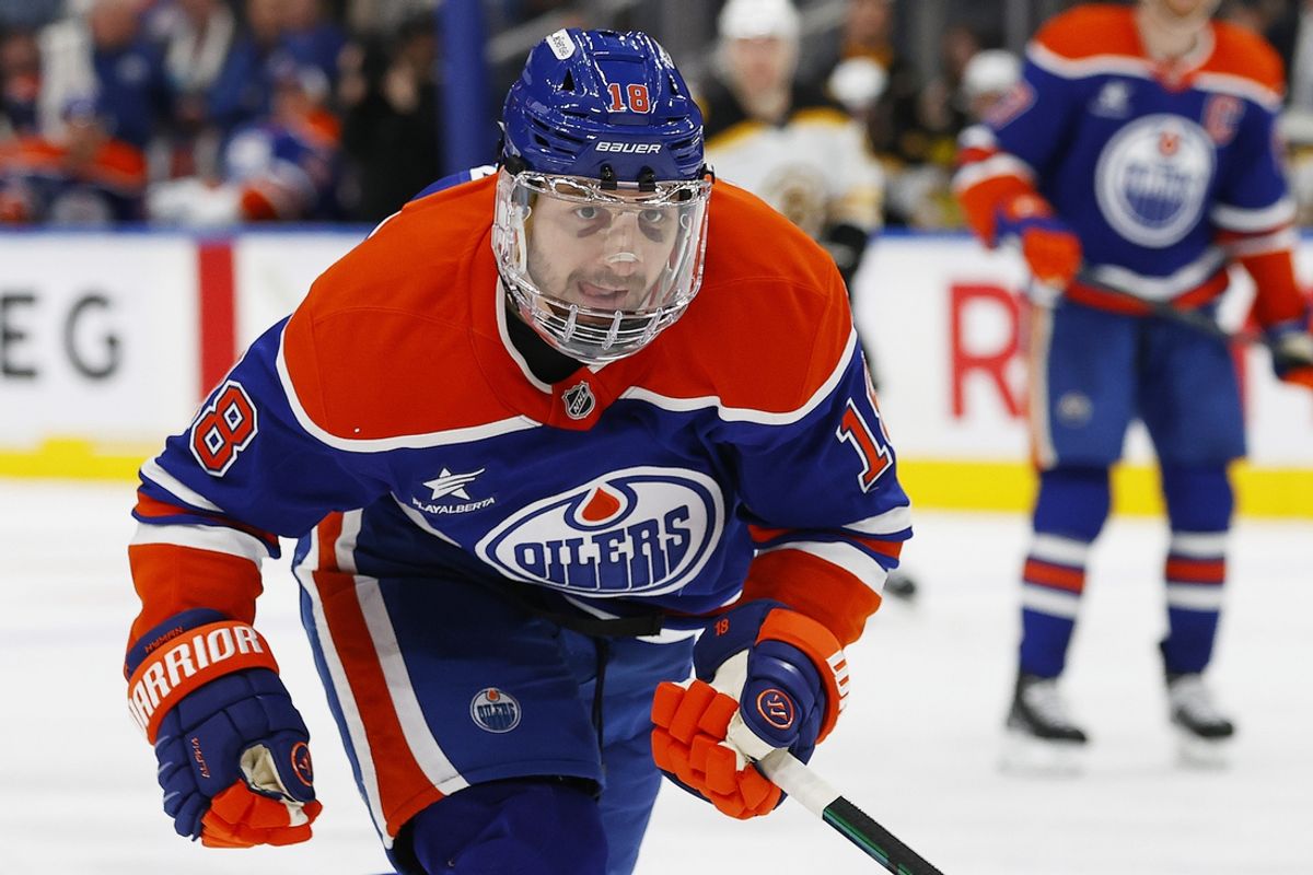 Dec 19, 2024; Edmonton, Alberta, CAN; Edmonton Oilers forward Zach Hyman (18) wears a full shield after breaking his nose in the last game, during the third period at Rogers Place. Mandatory Credit: Perry Nelson-Imagn Images