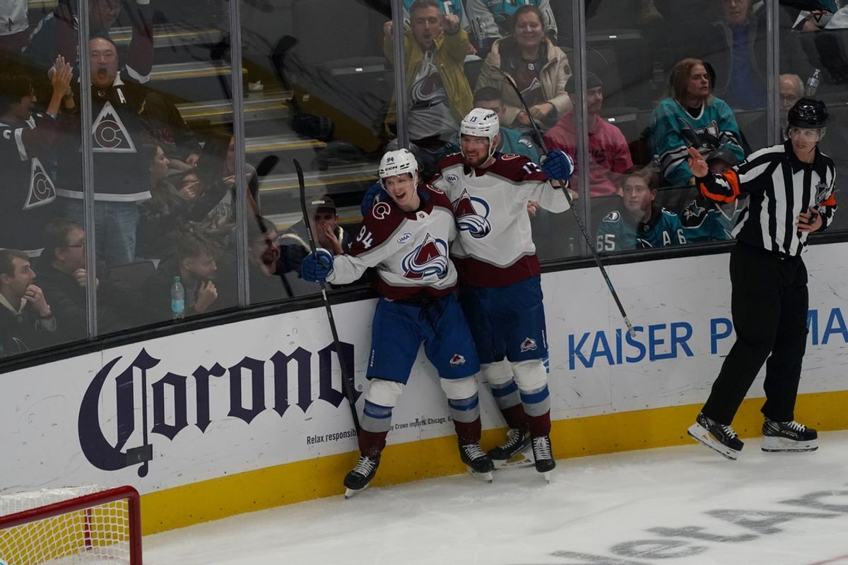 Dec 19, 2024; San Jose, California, USA;  Colorado Avalanche left wing Joel Kiviranta (94) celebrates with right wing Valeri Nichushkin (13) after scoring a goal against the San Jose Sharks during the third period at SAP Center at San Jose. Mandatory Credit: David Gonzales-Imagn Images