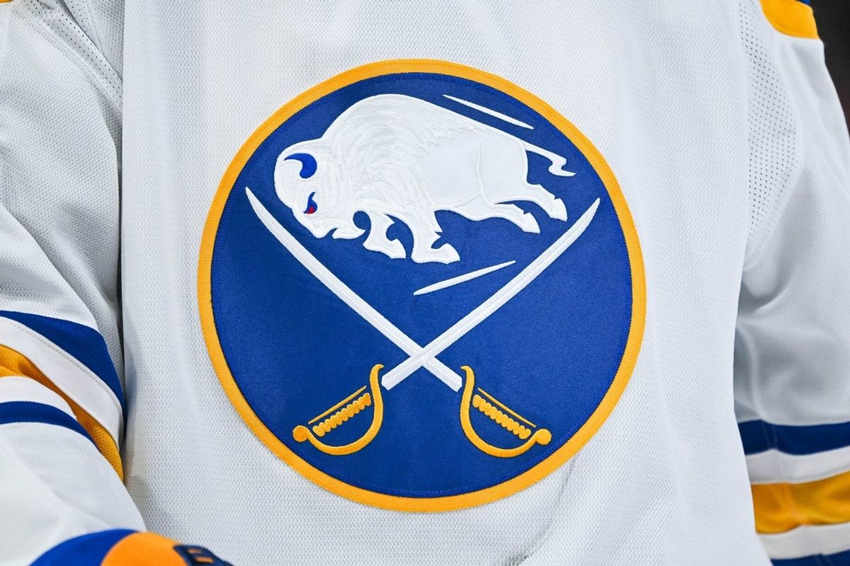 Dec 17, 2024; Montreal, Quebec, CAN; View of a Buffalo Sabres logo on a jersey worn by a member of the team during the second period at Bell Centre. Mandatory Credit: David Kirouac-Imagn Images