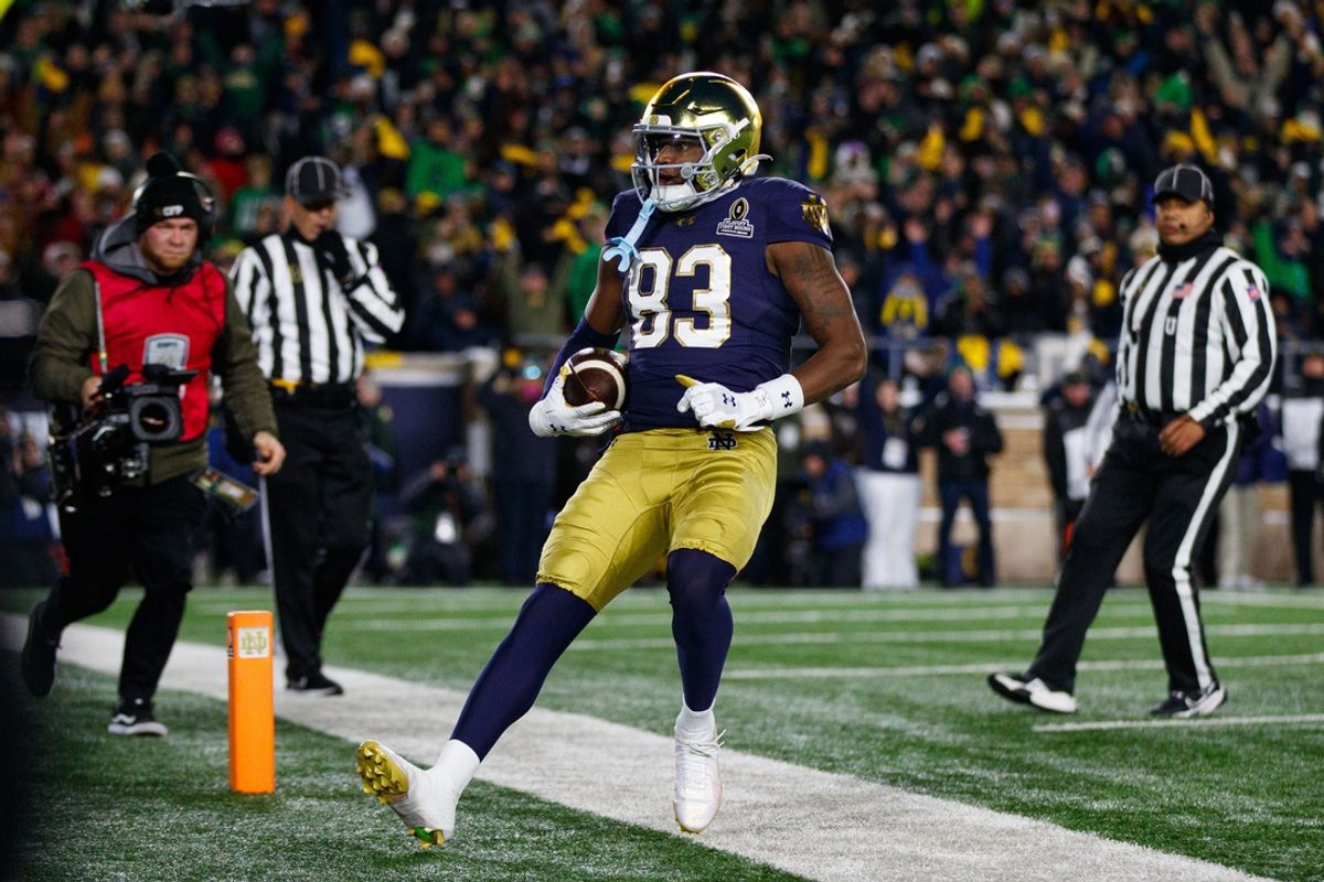 Notre Dame wide receiver Jayden Thomas (83) scores a touchdown during the first round of the College Football Playoff between Notre Dame and Indiana on Friday, Dec. 20, 2024, in South Bend.