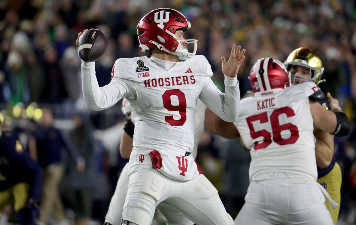 Dec 20, 2024; Notre Dame, Indiana, USA; Indiana Hoosiers quarterback Kurtis Rourke (9) throws during the second half against the Notre Dame Fighting Irish at Notre Dame Stadium. Mandatory Credit: Trevor Ruszkowski-Imagn Images