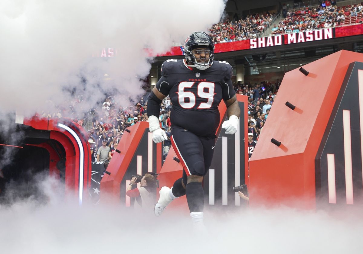 Dec 15, 2024; Houston Texans guard Shaq Mason (69) runs onto the field before the game against the Miami Dolphins at NRG Stadium. Mandatory Credit: Troy Taormina-Imagn Images
