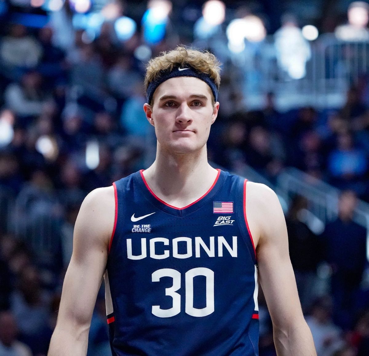 University of Connecticut’s Liam McNeeley (30) celebrates a basket during game between the Butler Bulldogs and the University of Connecticut Husks at Hinkle Fieldhouse on Saturday, Dec. 21, 2024, in Indianapolis.