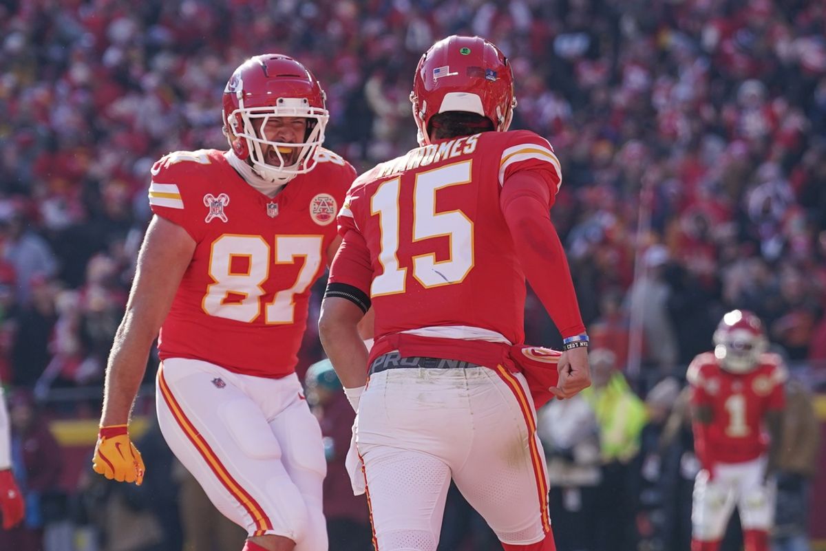 Dec 21, 2024; Kansas City, Missouri, USA; Kansas City Chiefs tight end Travis Kelce (87) celebrates with quarterback Patrick Mahomes (15) after Mahomes’ touchdown against the Houston Texans during the first half at GEHA Field at Arrowhead Stadium. Mandatory Credit: Denny Medley-Imagn Images