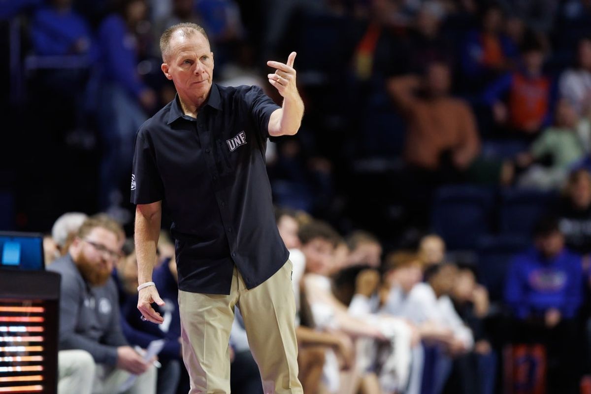 Dec 21, 2024; Gainesville, Florida, USA; North Florida Ospreys head coach Matthew Driscoll gestures against the Florida Gators during the second half at Exactech Arena at the Stephen C. O'Connell Center. Mandatory Credit: Matt Pendleton-Imagn Images