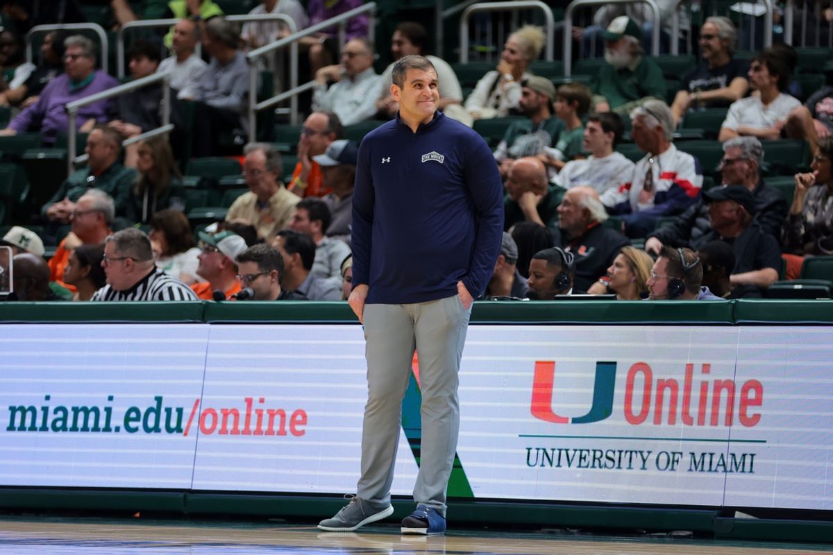 Dec 21, 2024; Coral Gables, Florida, USA; Mount St. Mary's Mountaineers head coach Donny Lind looks on from the sideline against the Miami Hurricanes during the first half at Watsco Center. Mandatory Credit: Sam Navarro-Imagn Images