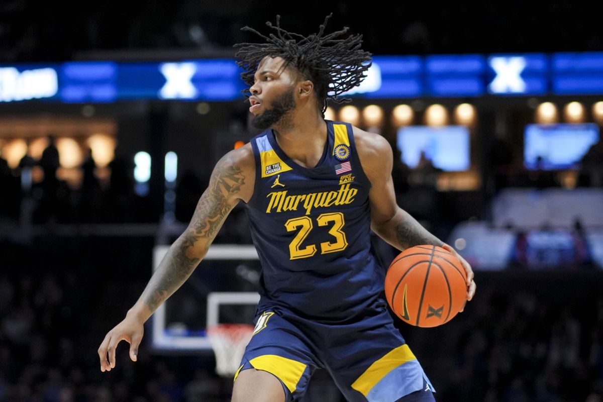 Dec 21, 2024; Cincinnati, Ohio, USA;  Marquette Golden Eagles forward David Joplin (23) dribbles the ball against the Xavier Musketeers in the second half at Cintas Center. Mandatory Credit: Aaron Doster-Imagn Images