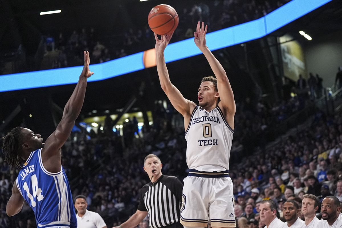 Dec 21, 2024; Atlanta, Georgia, USA; Georgia Tech Yellow Jackets guard Lance Terry (0) shoots over Duke Blue Devils guard Sion James (14) at McCamish Pavilion. Mandatory Credit: Dale Zanine-Imagn Images