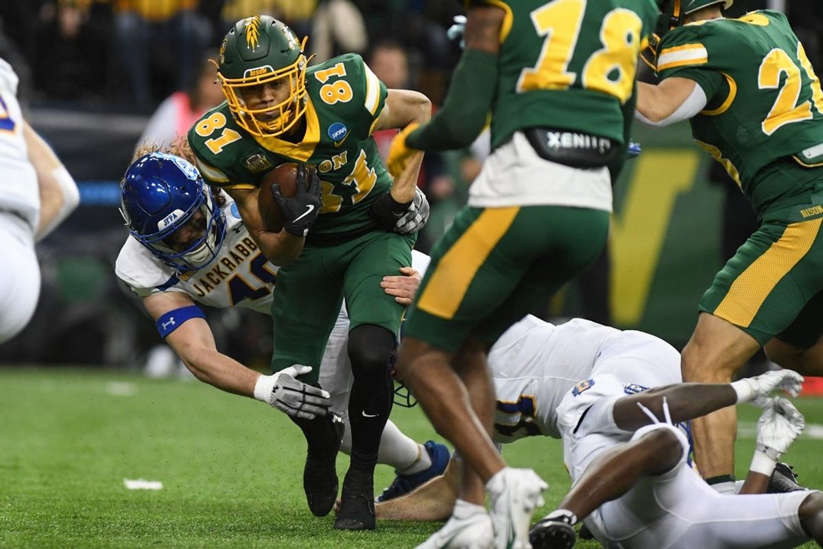 North Dakota State Bison wide receiver Jackson Williams (81) rushes the ball through South Dakota State defense on Saturday, Dec. 21, 2024, at Fargodome in Fargo, Nouth Dakota.