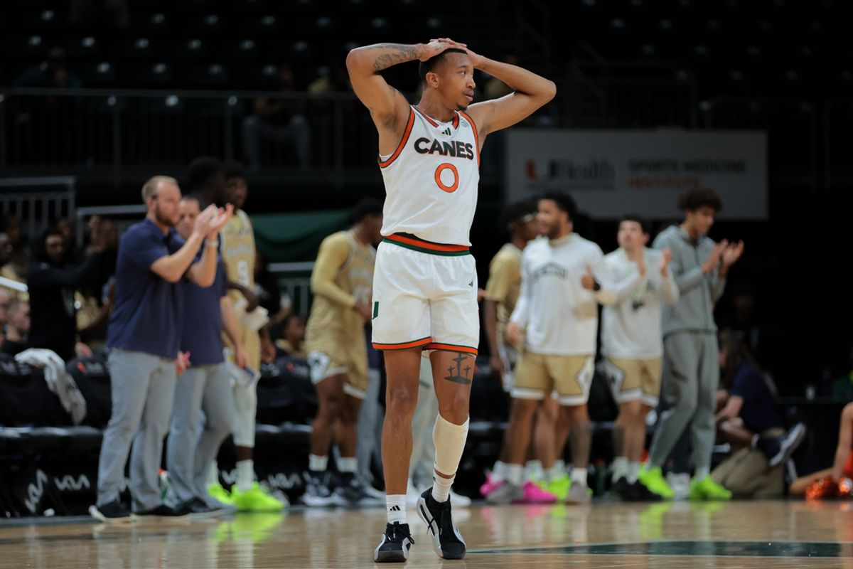 Dec 21, 2024; Coral Gables, Florida, USA; Miami Hurricanes guard Matthew Cleveland (0) reacts from the court against the Mount St. Mary's Mountaineers during the second half at Watsco Center. Mandatory Credit: Sam Navarro-Imagn Images