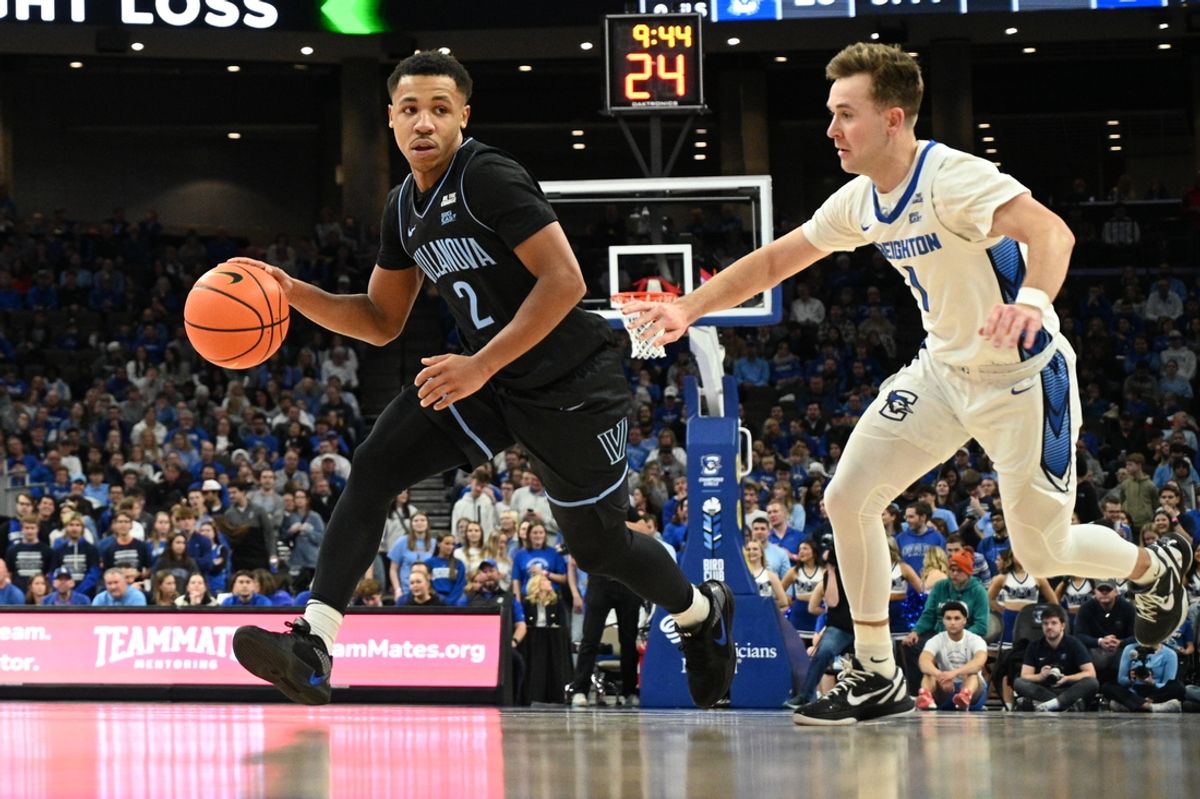 Dec 21, 2024; Omaha, Nebraska, USA;  Villanova Wildcats guard Jhamir Brickus (2) dribbles against Creighton Bluejays guard Steven Ashworth (1) in the first half at CHI Health Center Omaha. Mandatory Credit: Steven Branscombe-Imagn Images