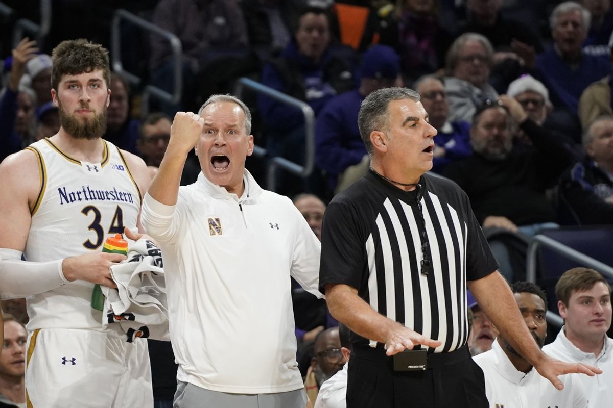 Dec 21, 2024; Evanston, Illinois, USA; Northwestern Wildcats head coach Chris Collins gestures during the second half of a game against the DePaul Blue Demons at Welsh-Ryan Arena. Mandatory Credit: David Banks-Imagn Images