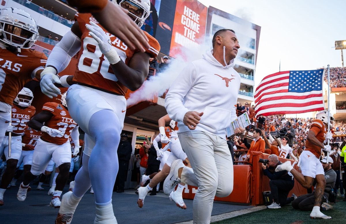 Texas Longhorns head coach Steve Sarkisian leads the team onto the field as the Texas Longhorns prepare to play the Clemson Tigers in the first round of the College Football Playoffs at Darrell K Royal Texas Memorial Stadium in Austin, Texas, Dec. 21, 2024.