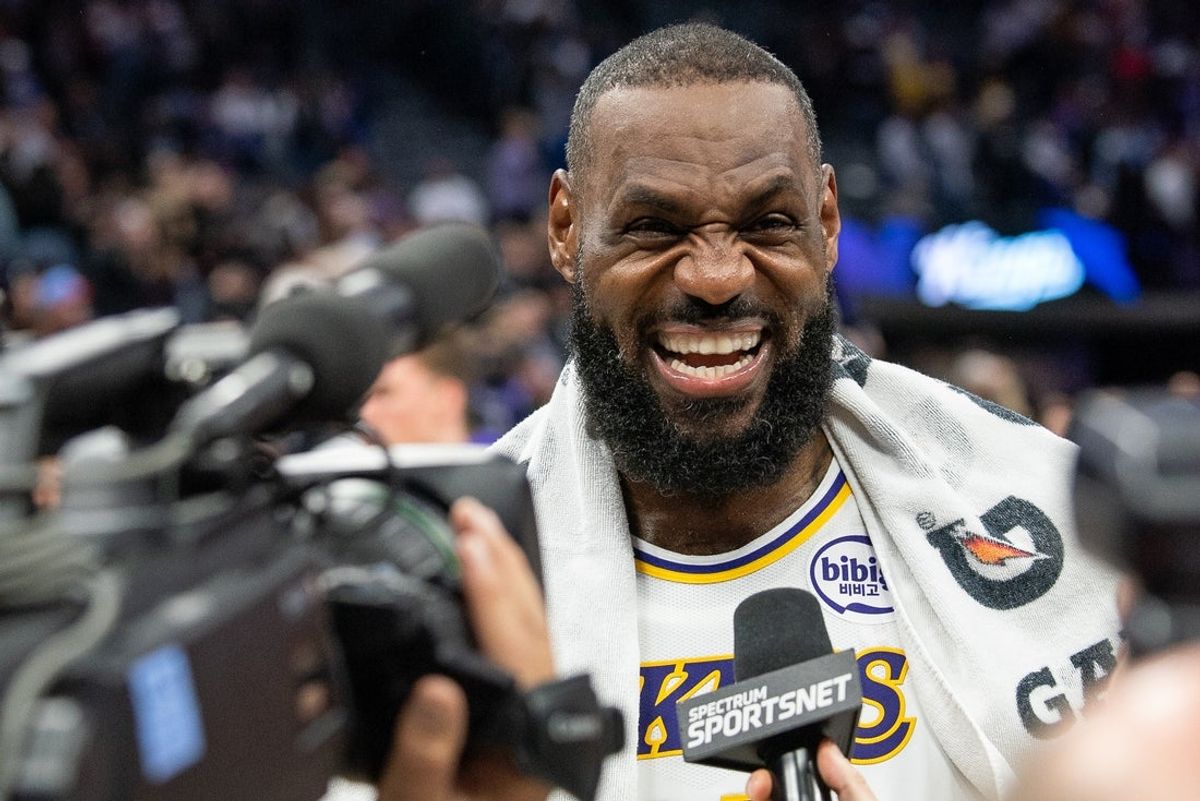 Dec 21, 2024; Sacramento, California, USA; Los Angeles Lakers forward LeBron James (23) reacts to a question during a post game interview after the game against the Sacramento Kings at Golden 1 Center. Mandatory Credit: Ed Szczepanski-Imagn Images