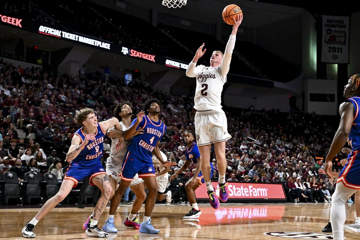 Dec 20, 2024; College Station, Texas, USA; Texas A&M Aggies guard Hayden Hefner (2) shoots the ball against the Houston Christian Huskies during the first half at Reed Arena. The Aggies defeated the Huskies 77-45. Mandatory Credit: Maria Lysaker-Imagn Images