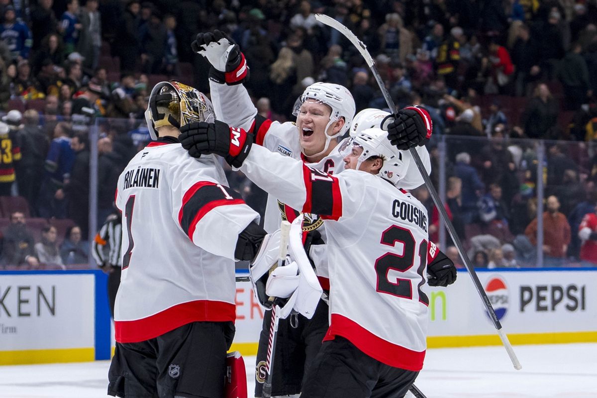 Dec 21, 2024; Vancouver, British Columbia, CAN; Ottawa Senators goalie Leevi Merilainen (1) and forward Brady Tkachuk (7) and forward Nick Cousins (21) celebrate the win against the Vancouver Canucks at Rogers Arena. Mandatory Credit: Bob Frid-Imagn Images