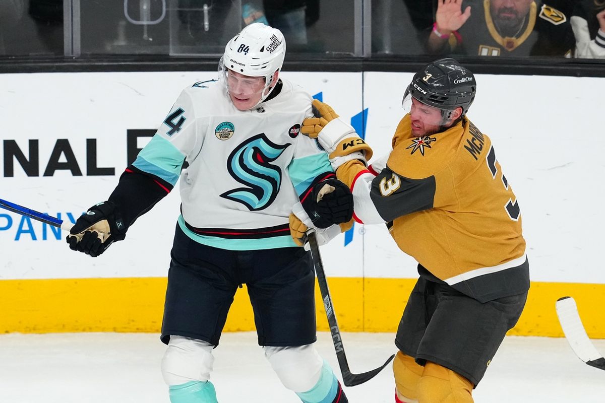 Dec 21, 2024; Las Vegas, Nevada, USA; Vegas Golden Knights defenseman Brayden McNabb (3) checks Seattle Kraken right wing Kaapo Kakko (84) during the third period at T-Mobile Arena. Mandatory Credit: Stephen R. Sylvanie-Imagn Images