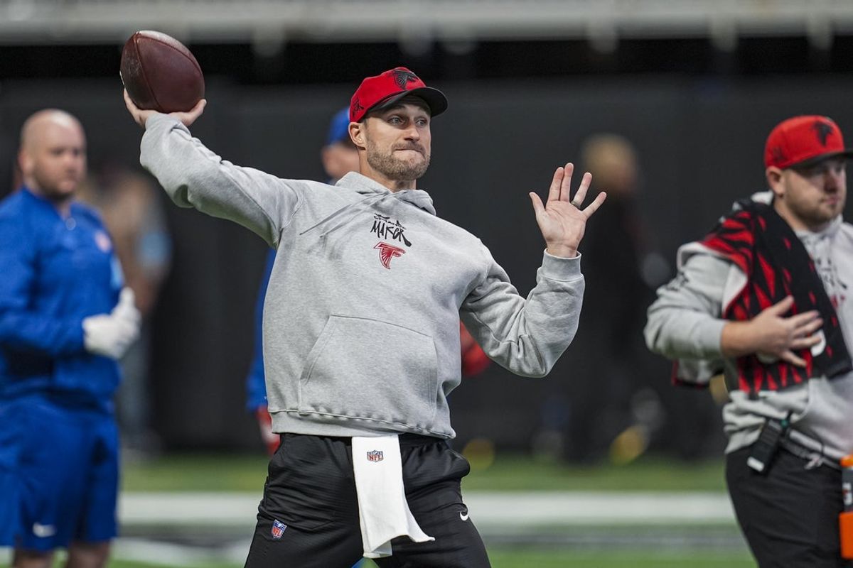 Dec 22, 2024; Atlanta, Georgia, USA; Atlanta Falcons quarterback Kirk Cousins (18) warms up on the field prior to the game against the New York Giants at Mercedes-Benz Stadium. Mandatory Credit: Dale Zanine-Imagn Images