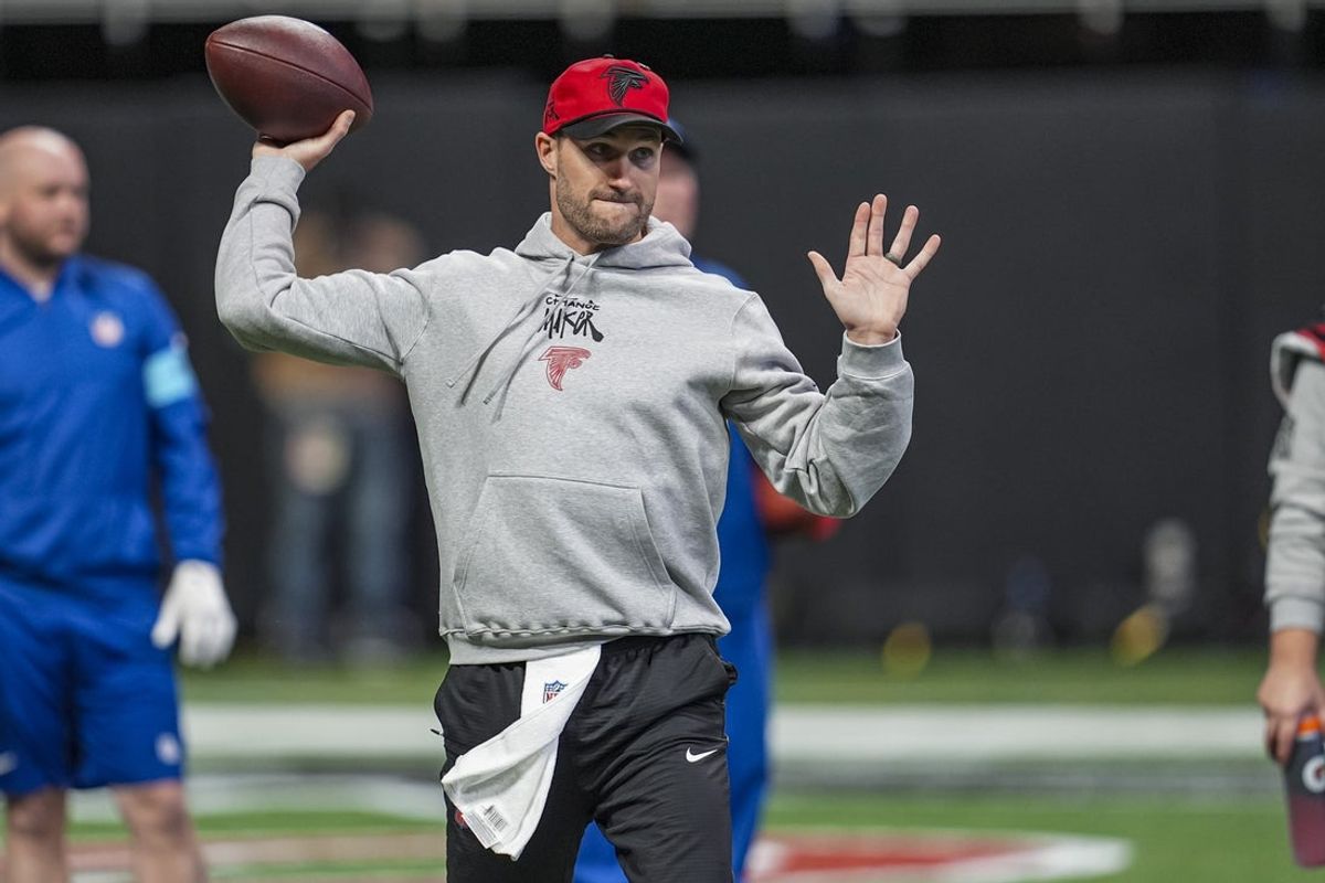 Dec 22, 2024; Atlanta, Georgia, USA; Atlanta Falcons quarterback Kirk Cousins (18) warms up on the field prior to the game against the New York Giants at Mercedes-Benz Stadium. Mandatory Credit: Dale Zanine-Imagn Images