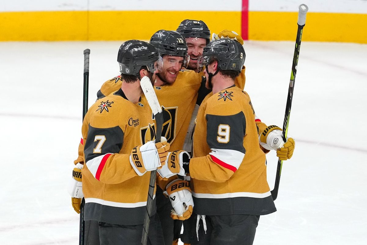 Dec 21, 2024; Las Vegas, Nevada, USA; Vegas Golden Knights defenseman Noah Hanifin (15) celebrates with Vegas Golden Knights defenseman Alex Pietrangelo (7), Vegas Golden Knights right wing Mark Stone (61), and Vegas Golden Knights center Jack Eichel (9) after scoring a goal against the Seattle Kraken during the third period at T-Mobile Arena. Mandatory Credit: Stephen R. Sylvanie-Imagn Images