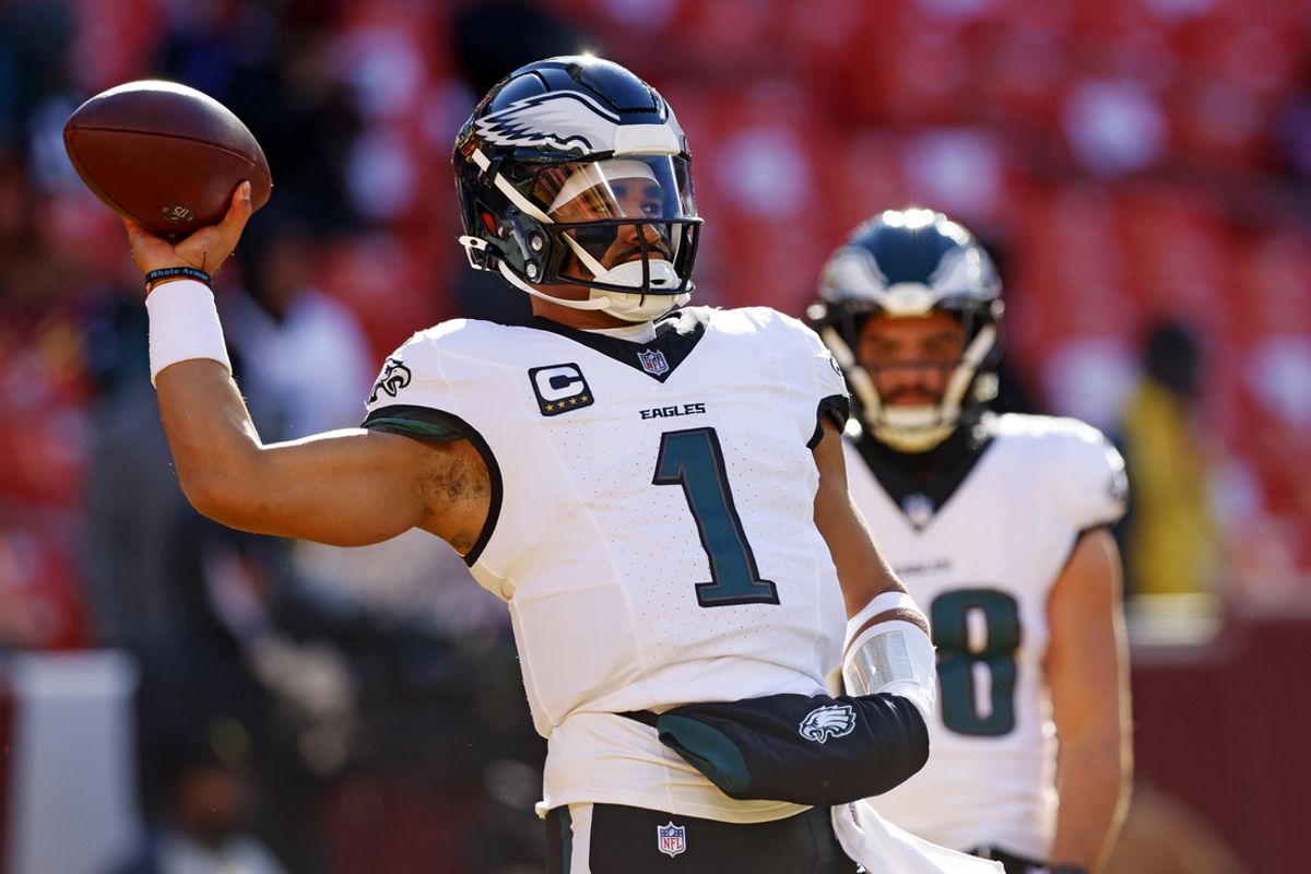 Dec 22, 2024; Landover, Maryland, USA; Philadelphia Eagles quarterback Jalen Hurts (1) warms up before the game against the Washington Commanders at Northwest Stadium. Mandatory Credit: Peter Casey-Imagn Images