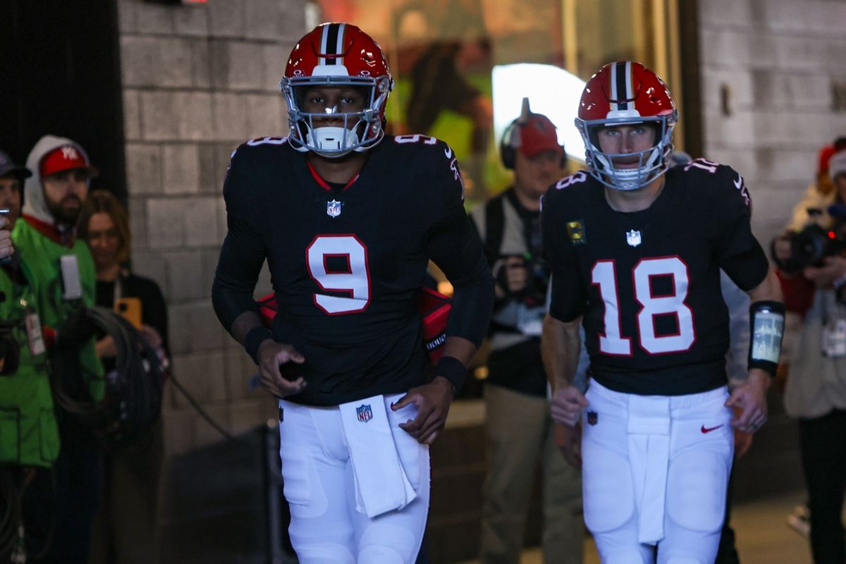 Dec 22, 2024; Atlanta, Georgia, USA; Atlanta Falcons quarterback Michael Penix Jr. (9) and quarterback Kirk Cousins (18) run on the field before a game against the New York Giants at Mercedes-Benz Stadium. Mandatory Credit: Brett Davis-Imagn Images