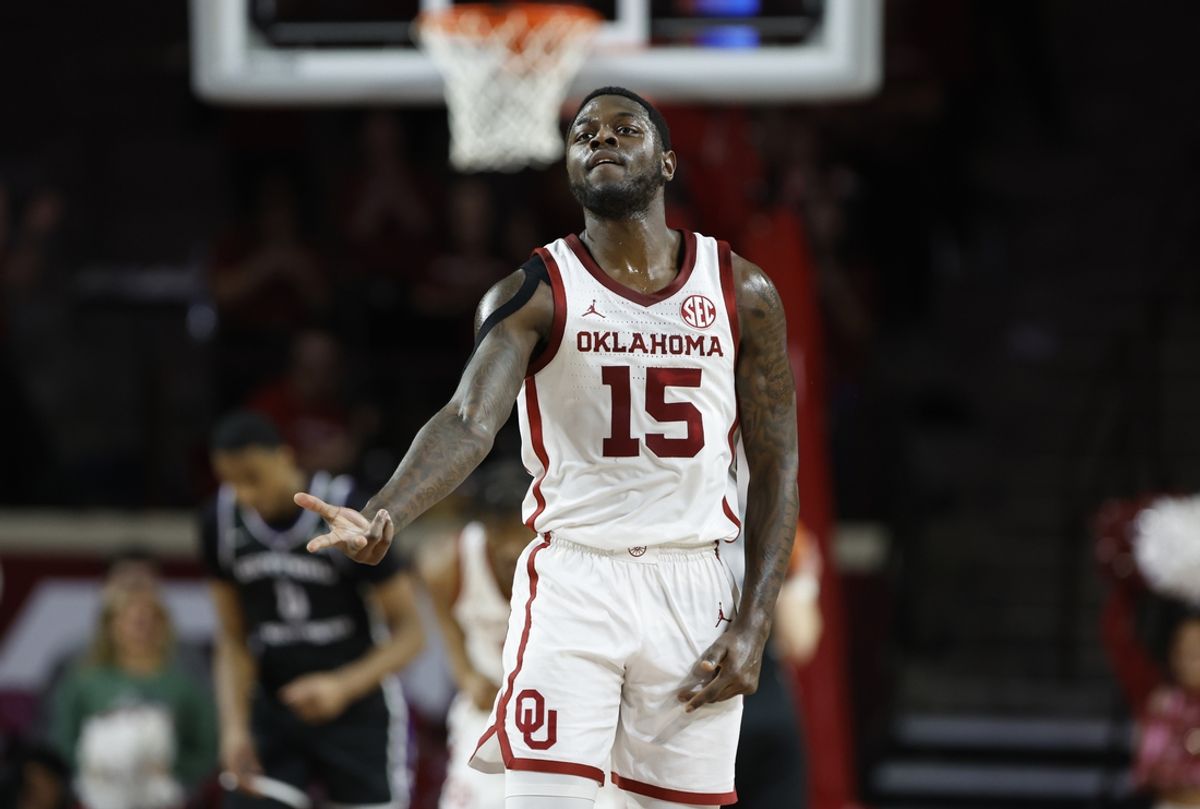 Dec 22, 2024; Norman, Oklahoma, USA; Oklahoma Sooners guard Duke Miles (15) reacts after a three point basket against the Central Arkansas Bears during the first half at Lloyd Noble Center. Mandatory Credit: Alonzo Adams-Imagn Images