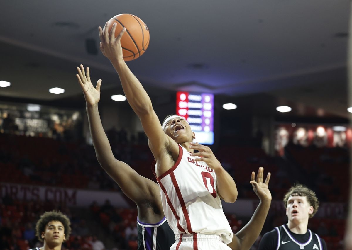 Dec 22, 2024; Norman, Oklahoma, USA; Oklahoma Sooners guard Jeremiah Fears (0) shoots against the Central Arkansas Bears during the second half at Lloyd Noble Center. Mandatory Credit: Alonzo Adams-Imagn Images