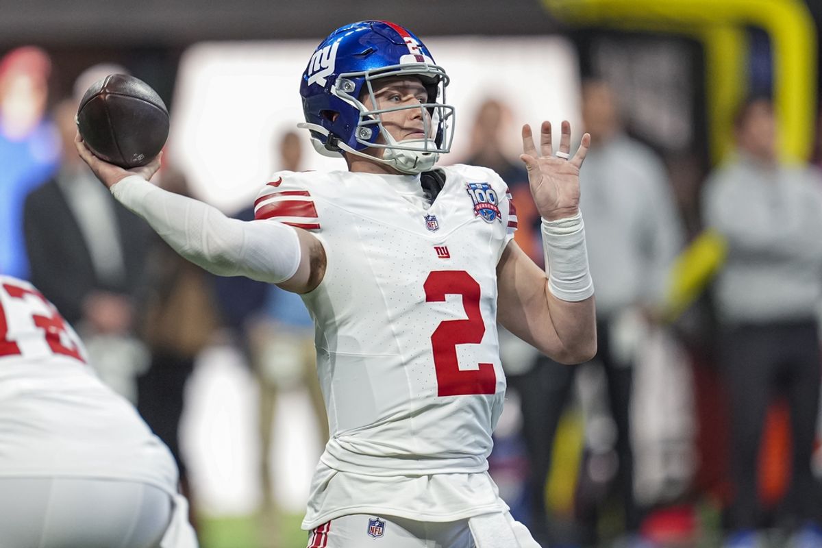 Dec 22, 2024; Atlanta, Georgia, USA; New York Giants quarterback Drew Lock (2) passes against the Atlanta Falcons during the second half at Mercedes-Benz Stadium. Mandatory Credit: Dale Zanine-Imagn Images