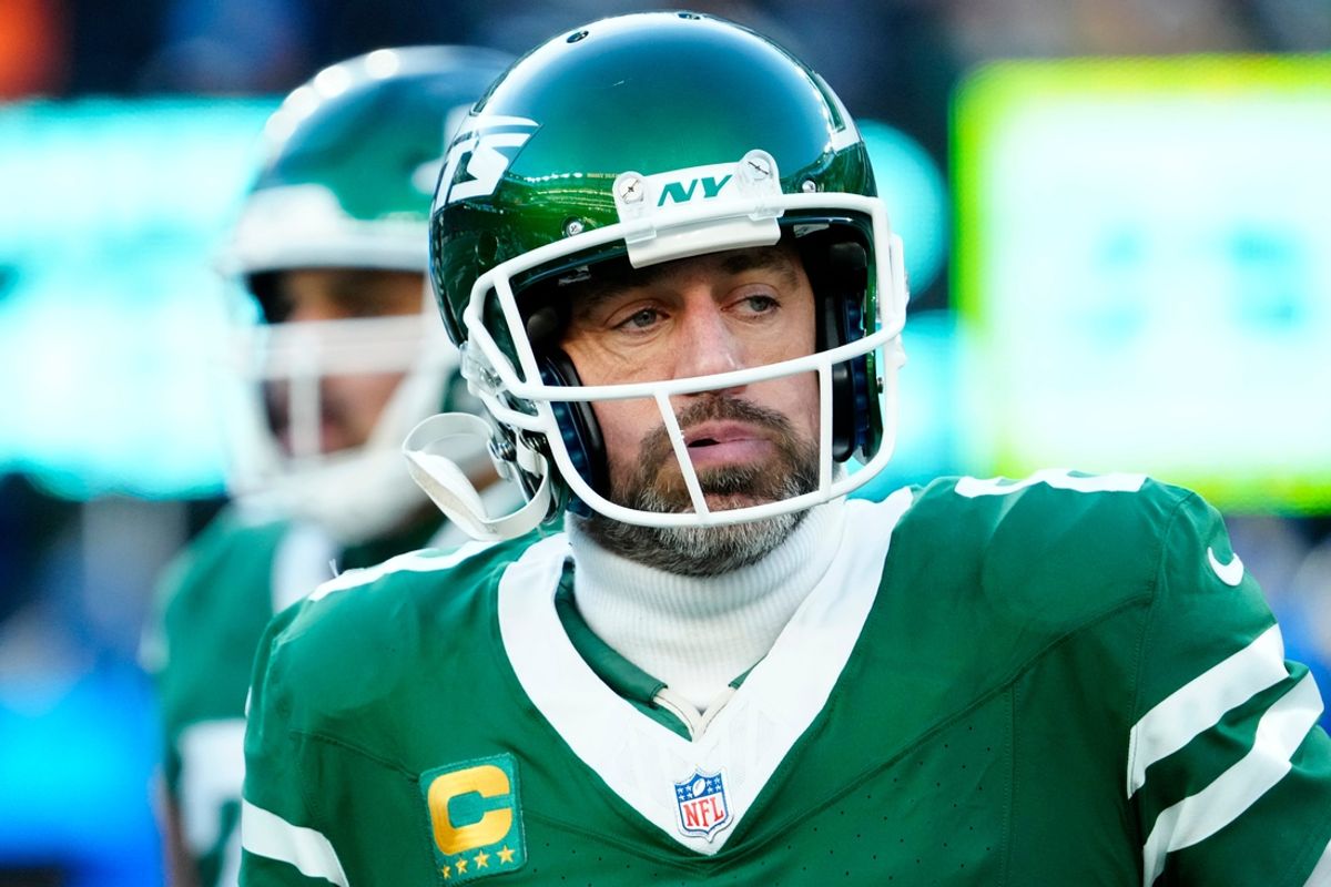 New York Jets quarterback Aaron Rodgers (8) limps off the field during a play where it appeared he had gotten injured, Sunday, December 22, 2024, in East Rutherford. Rodgers was back on the field during Gang GreenÕs next possession.