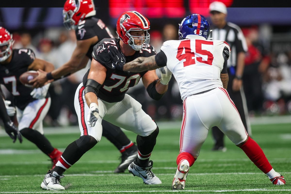Dec 22, 2024; Atlanta, Georgia, USA; Atlanta Falcons offensive tackle Jake Matthews (70) blocks New York Giants linebacker Tomon Fox (45) in the third quarter at Mercedes-Benz Stadium. Mandatory Credit: Brett Davis-Imagn Images
