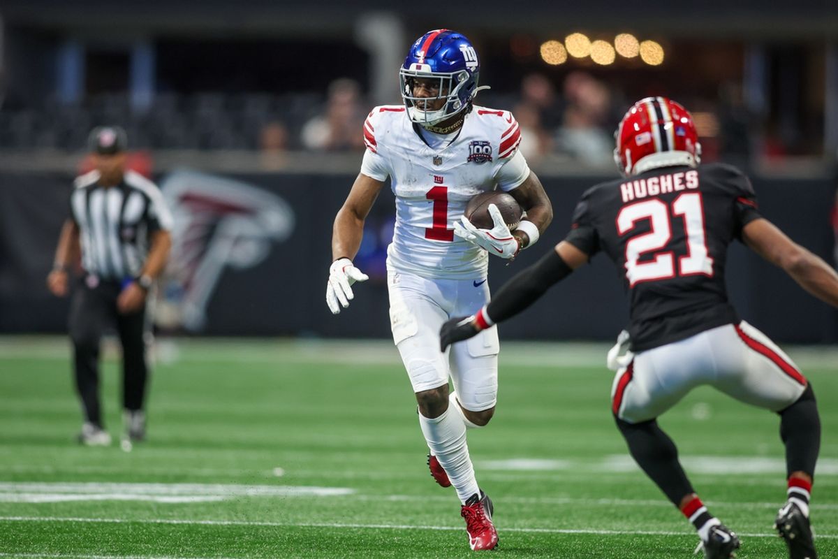 Dec 22, 2024; Atlanta, Georgia, USA; New York Giants wide receiver Malik Nabers (1) runs after a catch against the Atlanta Falcons in the fourth quarter at Mercedes-Benz Stadium. Mandatory Credit: Brett Davis-Imagn Images