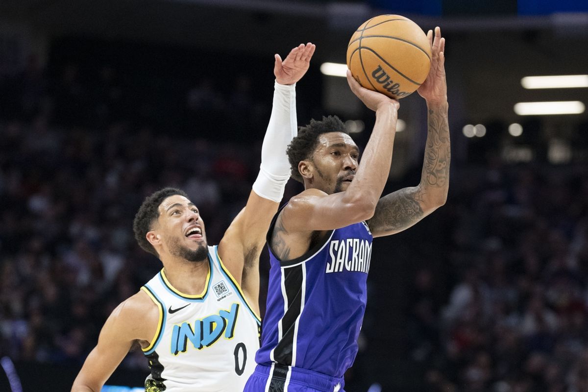 December 22, 2024; Sacramento, California, USA; Sacramento Kings guard Malik Monk (0) shoots the basketball against Indiana Pacers guard Tyrese Haliburton (0) during the second quarter at Golden 1 Center. Mandatory Credit: Kyle Terada-Imagn Images