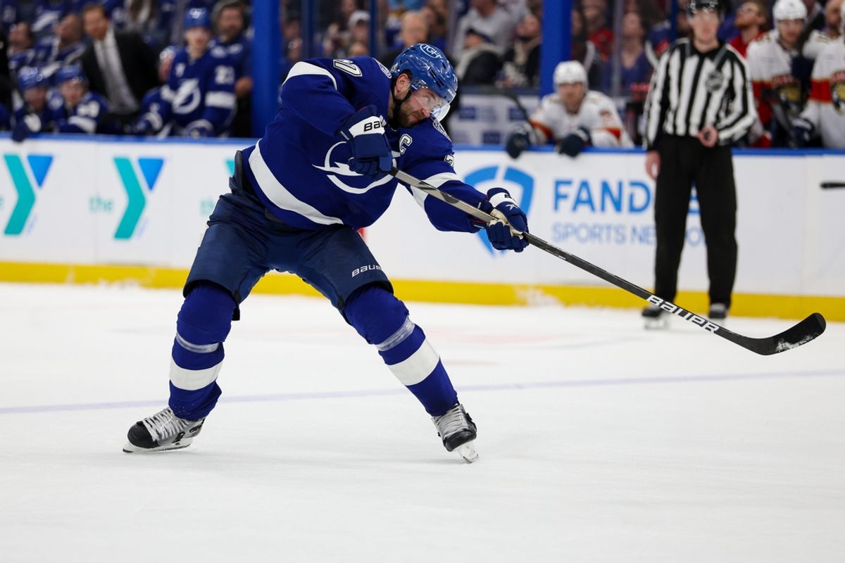 Dec 22, 2024; Tampa, Florida, USA; Tampa Bay Lightning defenseman Victor Hedman (77) shoots the puck against the Florida Panthers in the third period at Amalie Arena. Mandatory Credit: Nathan Ray Seebeck-Imagn Images