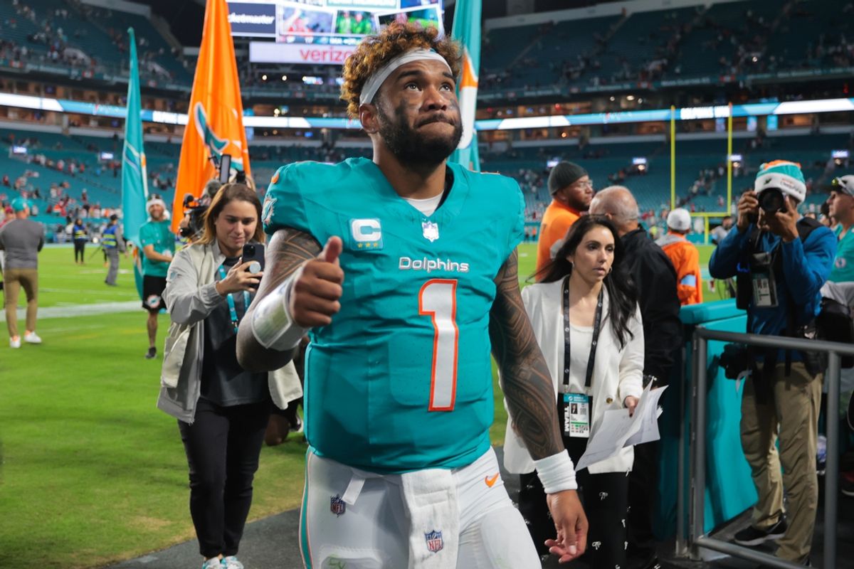 Dec 22, 2024; Miami Gardens, Florida, USA; Miami Dolphins quarterback Tua Tagovailoa (1) reacts front field after theme against the San Francisco 49ers at Hard Rock Stadium. Mandatory Credit: Sam Navarro-Imagn Images