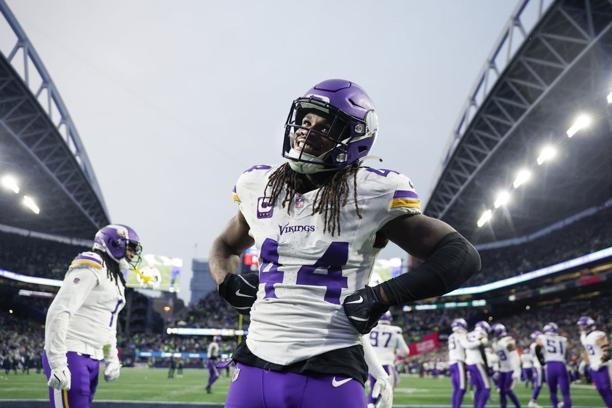 Dec 22, 2024; Seattle, Washington, USA; Minnesota Vikings safety Josh Metellus (44) poses for a photo following a Seattle Seahawks turnover during the fourth quarter at Lumen Field. Mandatory Credit: Joe Nicholson-Imagn Images