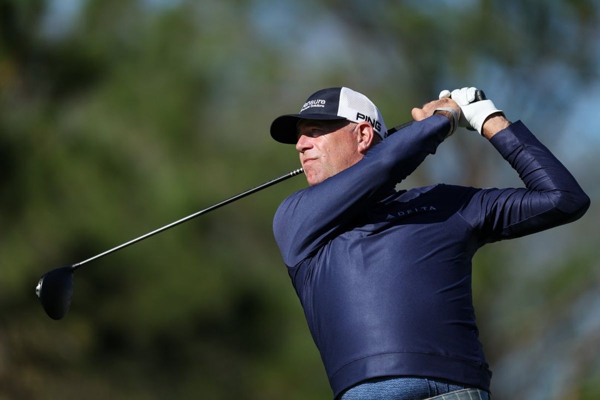 Dec 22, 2024; Orlando, Florida, [USA]; Stewart Cink hits a drive on the second hole during the PNC Championship at The Ritz-Carlton Golf Club. Mandatory Credit: Nathan Ray Seebeck-Imagn Images