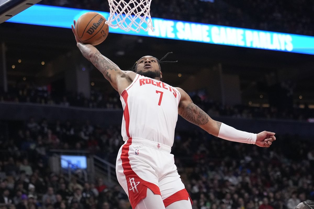 Dec 22, 2024; Toronto, Ontario, CAN; Houston Rockets forward Cam Whitmore (7) goes to dunk the ball against the Toronto Raptors during the second half at Scotiabank Arena. Mandatory Credit: John E. Sokolowski-Imagn Images