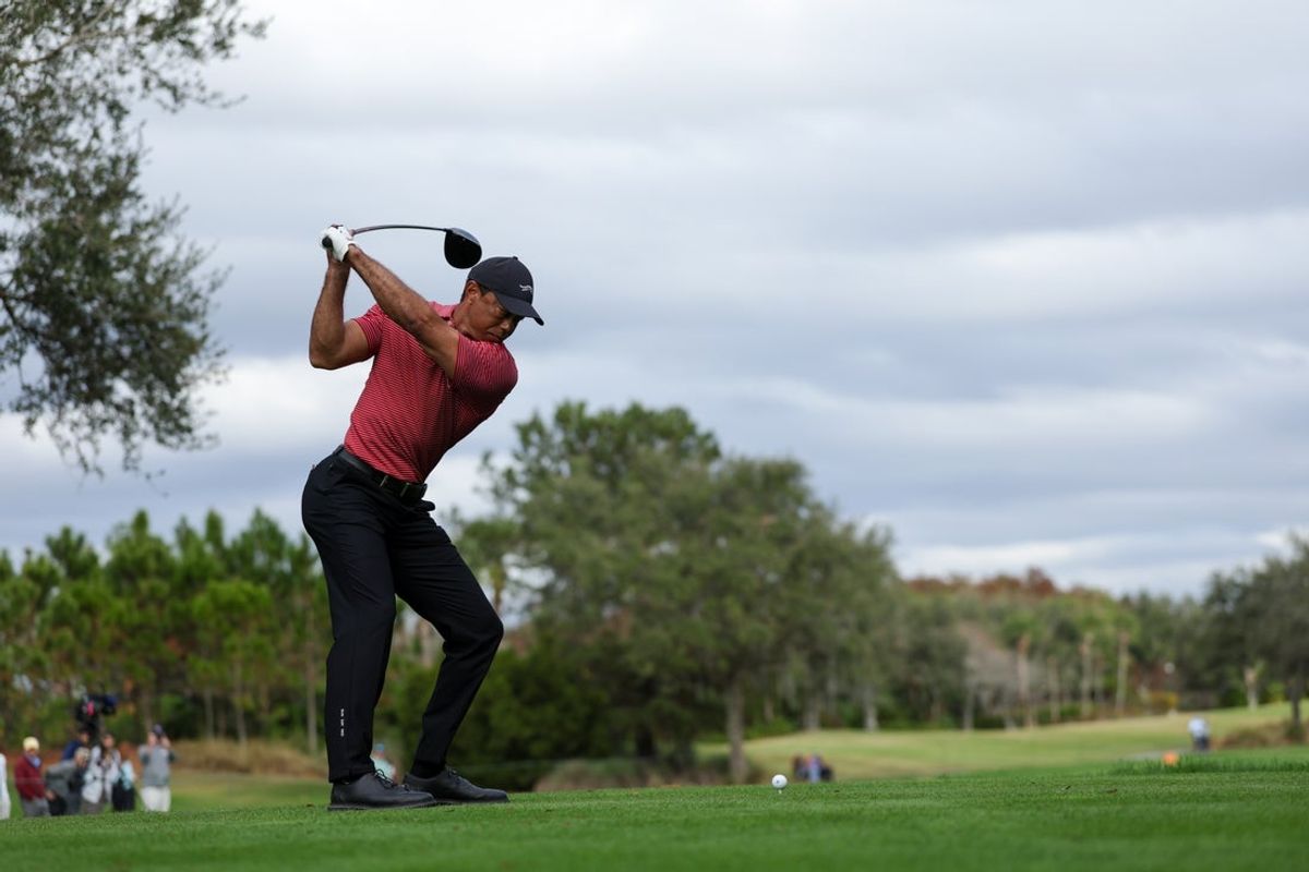 Dec 22, 2024; Orlando, Florida, [USA]; Tiger Woods tees off not the 15th hole during the PNC Championship at The Ritz-Carlton Golf Club. Mandatory Credit: Nathan Ray Seebeck-Imagn Images