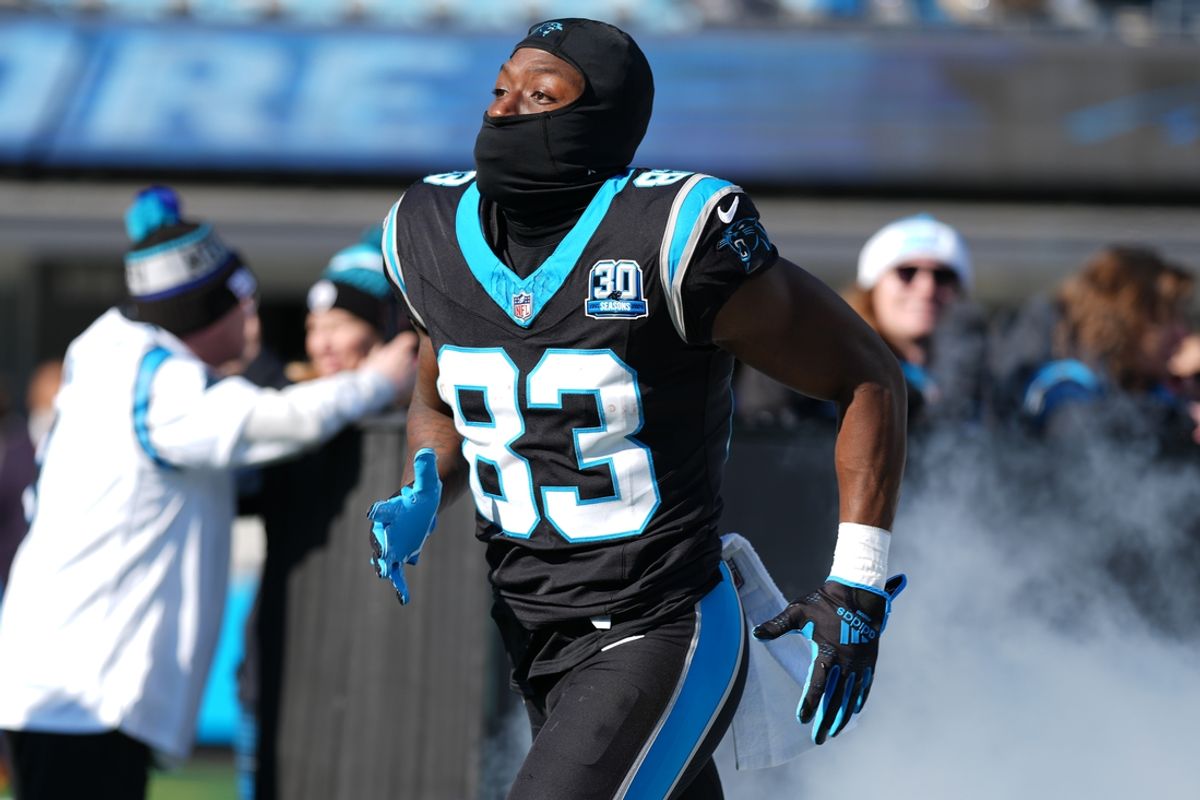Dec 22, 2024; Charlotte, North Carolina, USA; Carolina Panthers wide receiver David Moore (83) takes the field during the first quarter against the Arizona Cardinals at Bank of America Stadium. Mandatory Credit: Jim Dedmon-Imagn Images