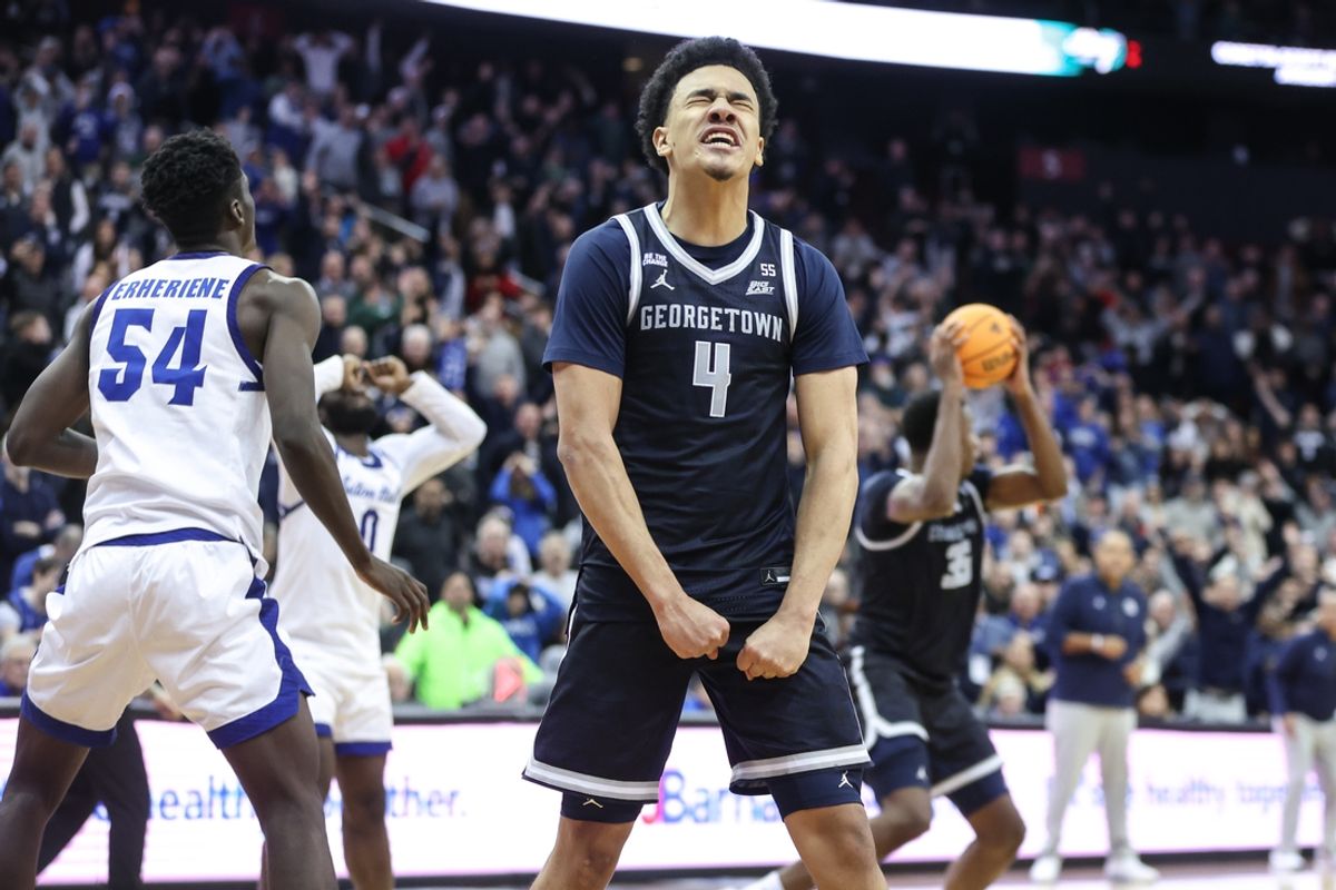 Dec 22, 2024; Newark, New Jersey, USA; Georgetown Hoyas forward Caleb Williams (4) celebrates after defeating the Seton Hall Pirates 61-60 at Prudential Center. Mandatory Credit: Wendell Cruz-Imagn Images