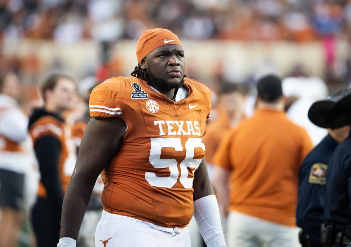 Dec 21, 2024; Austin, Texas, USA; Texas Longhorns offensive lineman Cameron Williams (56) against the Clemson Tigers during the CFP National playoff first round at Darrell K Royal-Texas Memorial Stadium. Mandatory Credit: Mark J. Rebilas-Imagn Images