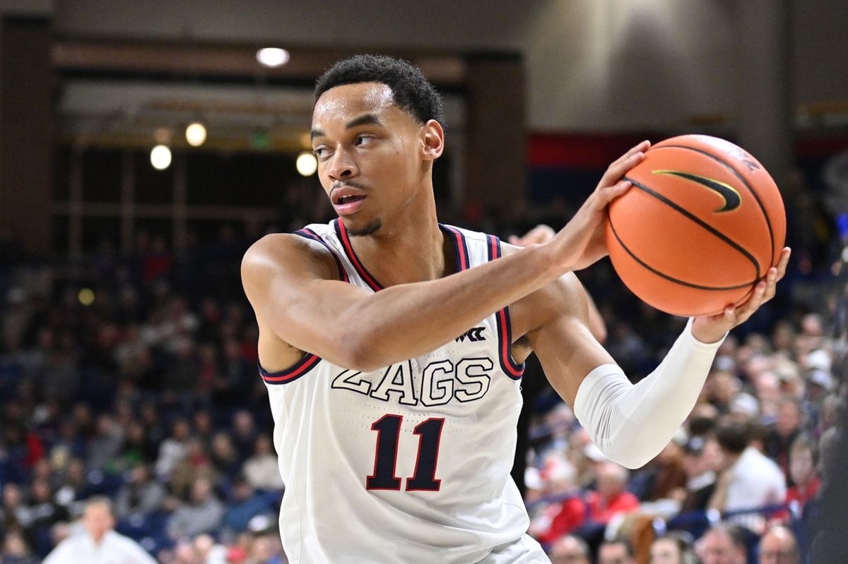 Dec 18, 2024; Spokane, Washington, USA; Gonzaga Bulldogs guard Nolan Hickman (11) controls the ball against the Nicholls State Colonels in the first half at McCarthey Athletic Center. Mandatory Credit: James Snook-Imagn Images