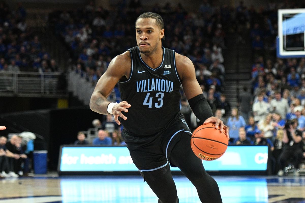 Dec 21, 2024; Omaha, Nebraska, USA;  Villanova Wildcats forward Eric Dixon (43) dribbles against the Creighton Bluejays in the first half at CHI Health Center Omaha. Mandatory Credit: Steven Branscombe-Imagn Images