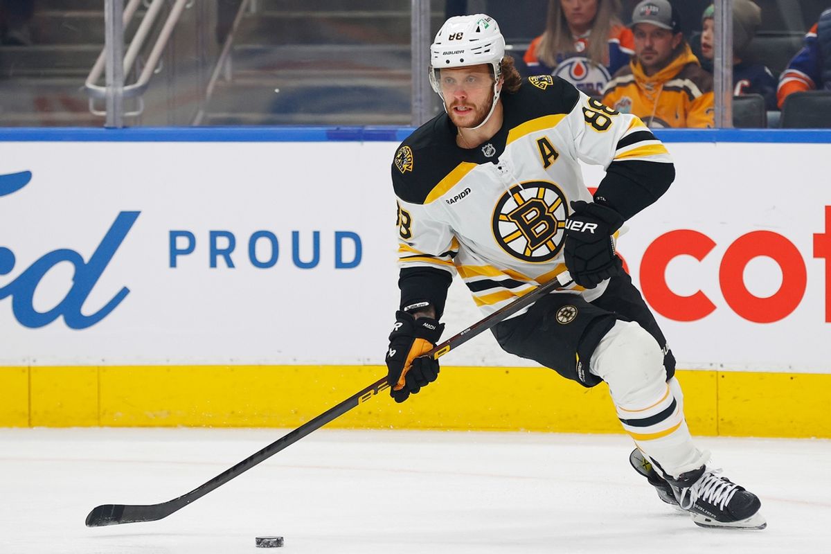 Dec 19, 2024; Edmonton, Alberta, CAN; Boston Bruins forward David Pastrnak (88) looks to make a pass against the Edmonton Oilers at Rogers Place. Mandatory Credit: Perry Nelson-Imagn Images