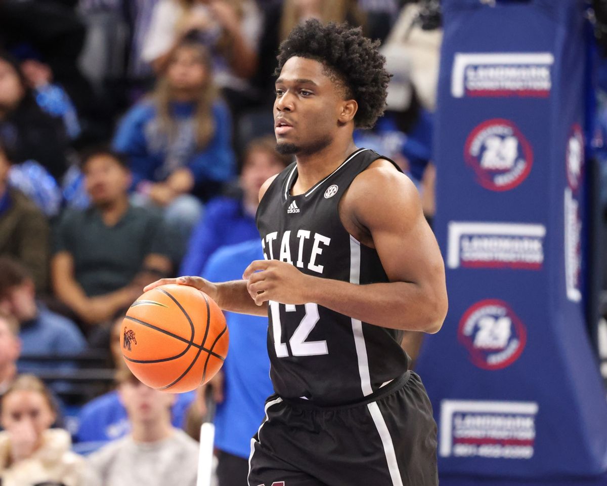 Dec 21, 2024; Memphis, Tennessee, USA; Mississippi State Bulldogs guard Josh Hubbard (12) dribbles the ball against the Memphis Tigers during the second half at FedExForum. Mandatory Credit: Wesley Hale-Imagn Images